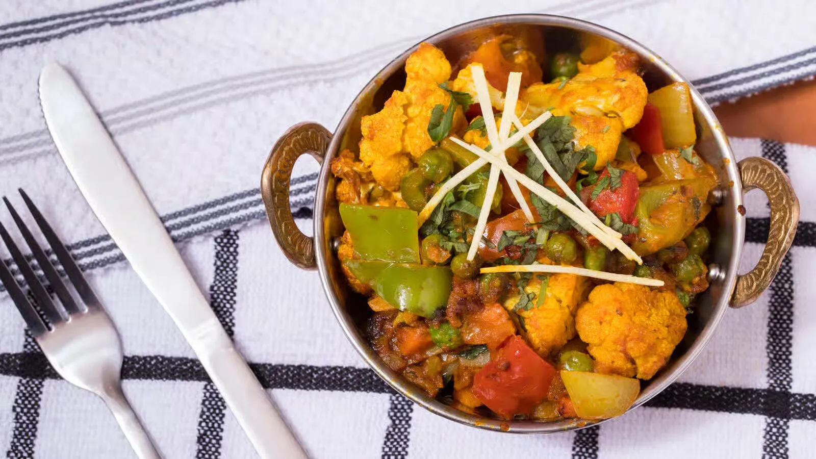 Lamb curry with aromatic spices at Shahi Flames St. Boniface